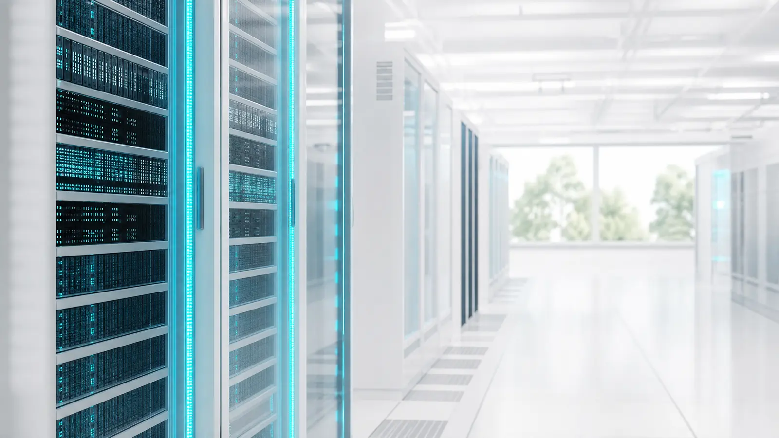 Rows of high-tech server racks with cyan lighting in a bright data center.