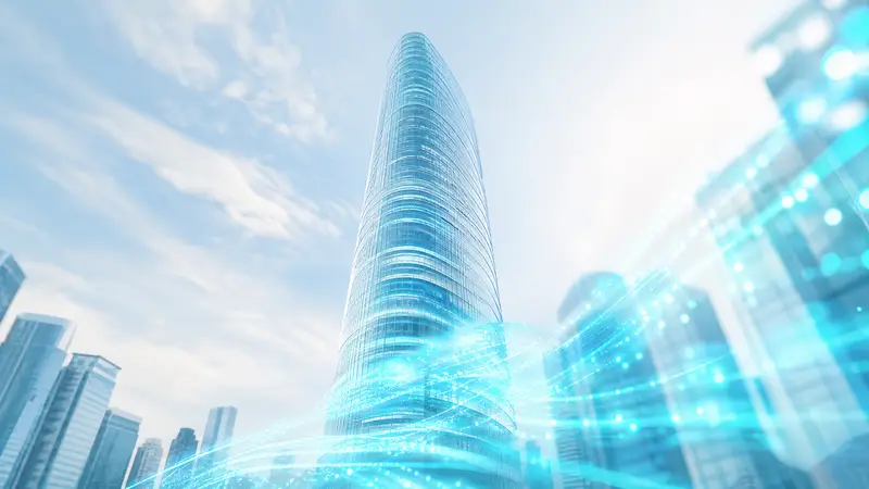 A high-tech office building in Singapore illuminated with cyan lights at night.